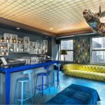 Chaises Nicolle's metal chairs at Chicago's Virgin Hotel bar by Paola Navone