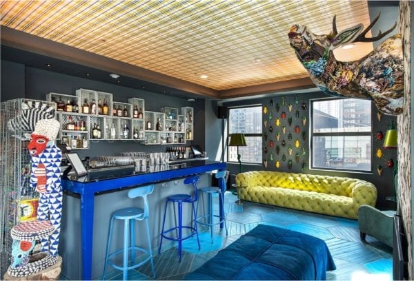 Chaises Nicolle's metal chairs at Chicago's Virgin Hotel bar by Paola Navone