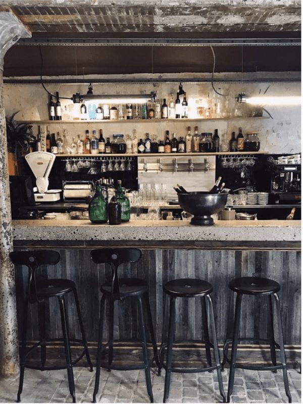 Metal Nicolle stool with a height of 80-cm. The counter of the La Famille restaurant in Perpignan.