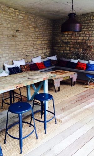 Metal Nicolle stool H60-cm - Industrial metal stool by Nicolle gathered around a high table in a house in Bourgogne.