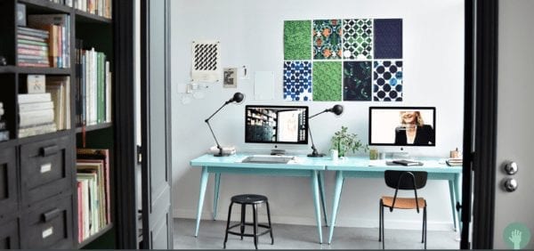 Metal Nicolle stool, 18-inch height. Cecile Halley sitting on Nicolle stool in a graphic design agency.