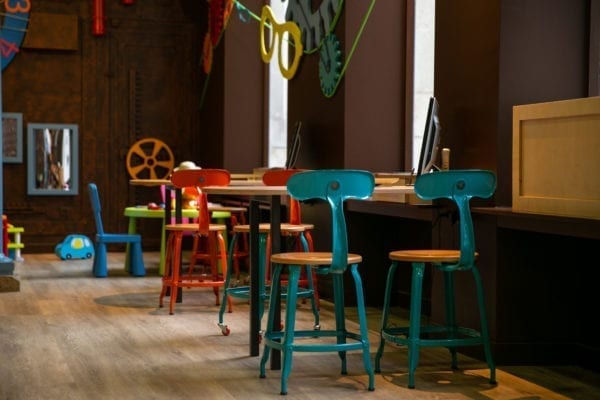 Colorful wood and metal chair at KIDS OPTIC