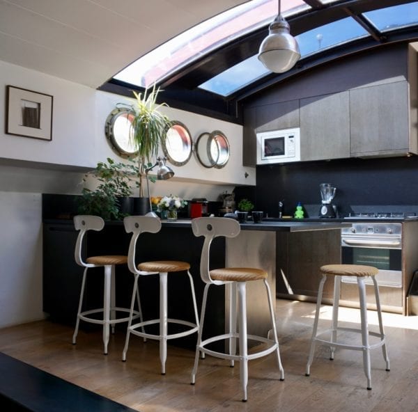 Nicolle chairs and stools in LOOM and metal in a Parisian kitchen.