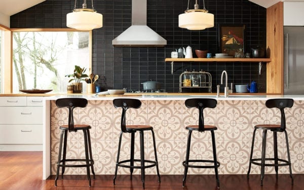 Open kitchen with Nicolle industrial chair, featuring leather seat cushions for a touch of rejuvenation.