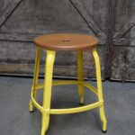 Yellow zinc Chaises Nicolle wooden and metal stool, 45-cm high.