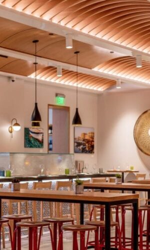 Nicolle high stool with wood and metal at The Hall Global Eatery, Amar Santana, Costa Mesa, USA.