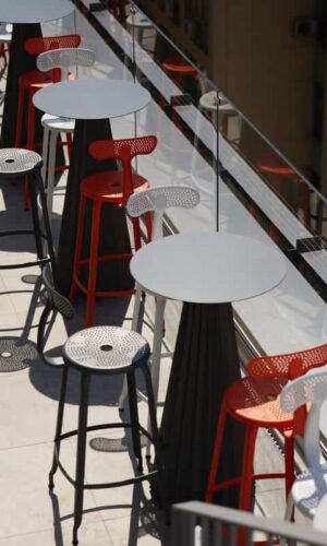 Outdoor metal chair by Chaises Nicolle, with a height of 75-cm, featured at the PINDAROS ROOFTOP of the Fresh Hotel.