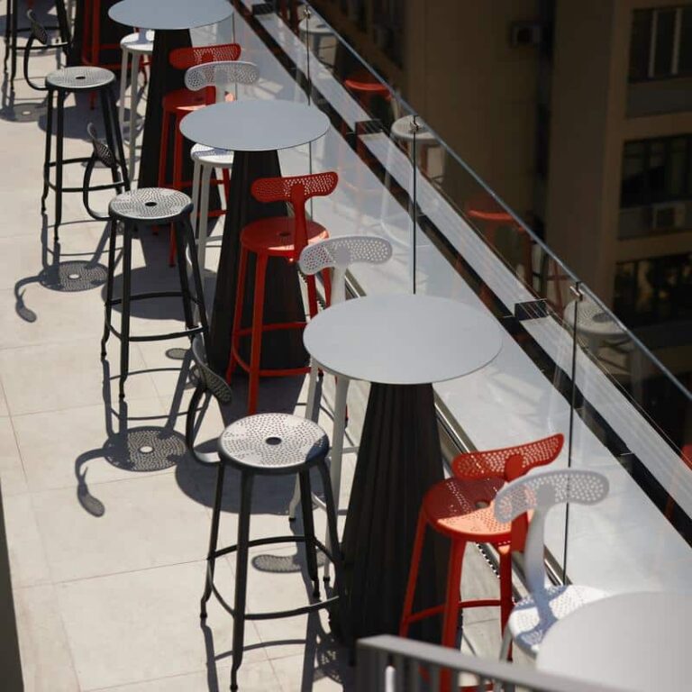 Outdoor metal chair by Chaises Nicolle, with a height of 75-cm, featured at the PINDAROS ROOFTOP of the Fresh Hotel.