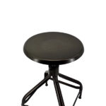 Adjustable Nicolle stool with a height range of , made of patinated steel.